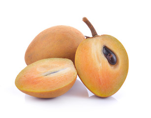 fresh sapodilla fruits on white background