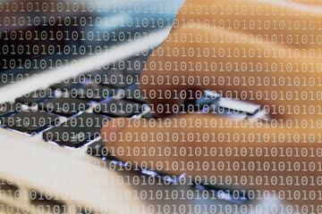 double exposure of a programmer coding on his laptop dissolved w