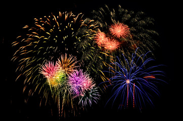 Firework celebration on dark background.