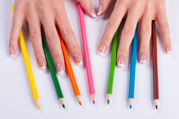 Wall Mural - Beautiful french manicure with pencils.