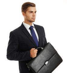 Poster - Elegant man in suit with briefcase isolated on white