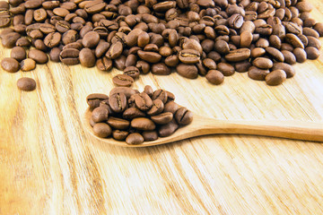 Wall Mural - Coffee beans on vintage wooden board