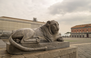 Poster -  Statues of lionesses in the square of Piazza del Plebiscito. Gloomy autumn day  at Church of San Francesco di Paola in  Piazza del Plebiscito ,historical place in Naples, Italy.