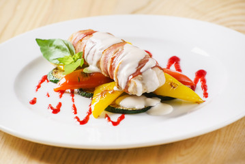 Wall Mural - chicken rolls wrapped in strips of bacon