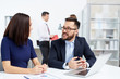 © pressmaster - Explaining idea to colleague