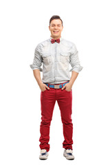 Poster - Young fashionable man posing in red jeans