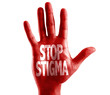 Stop Stigma written on hand with sky background