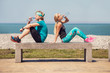 © Soloviova Liudmyla - Young man and woman drink a water after outdoor training