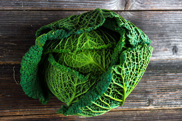 Sticker - Savoy cabbage on wooden background