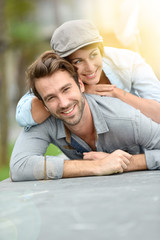 Wall Mural - Romantic couple relaxing in town