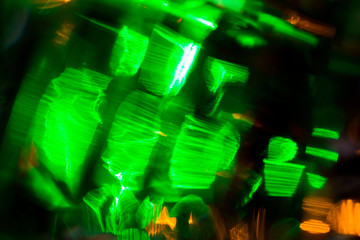 Wall Mural - colorful night lights bokeh over dark background