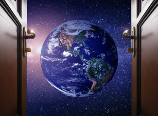 Wall Mural - room door to planet earth from the space. some elements of this