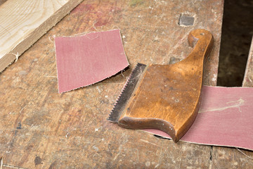 Wall Mural - carpenter working with plane on wooden