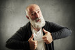 © ArtFamily - laughing bearded man showing thumbs up