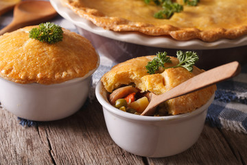 Wall Mural - American cuisine: chicken pie with vegetables in a pot. Horizontal
