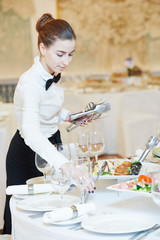 Waitress woman in restaurant