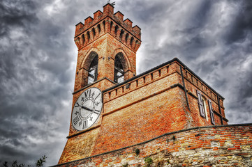 Brisighella clock tower under an overcast sky