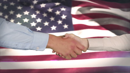 Poster - Hands shaking against american flag
