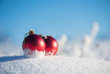 Red Christmas Ball In Fresh Snow