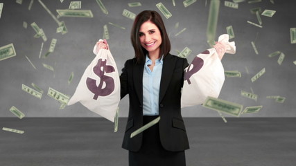 Poster - Composite video of businesswoman holding money bags 