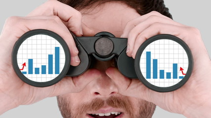 Poster - Man looking through binoculars