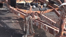 Rusted Iron Chains On Rusty Boat Yacht Trailer In Harbor Near Ocean