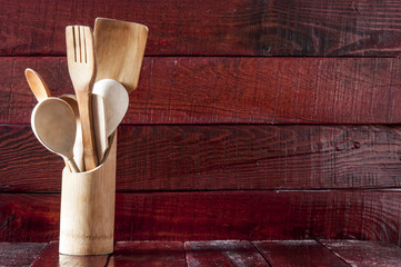 Wooden spoon and fork on table