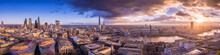 Panoramic Skyline Of The East And South Part Of London With Beautiful Clouds At Sunset. This Wide View Includes The Bank District, The Tower Bridge, Shard Tower, Tate Modern Museum And London Eye