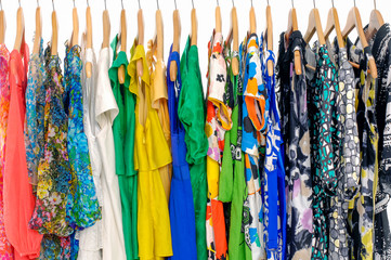 Set of fashion female colorful clothing hanging a on display