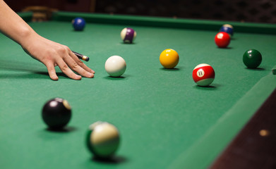 man playing billiard