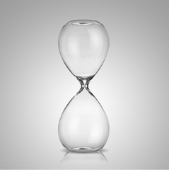 Wall Mural - Empty hourglass on gray background