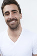 © sanneberg - Portrait of smiling young man in white
