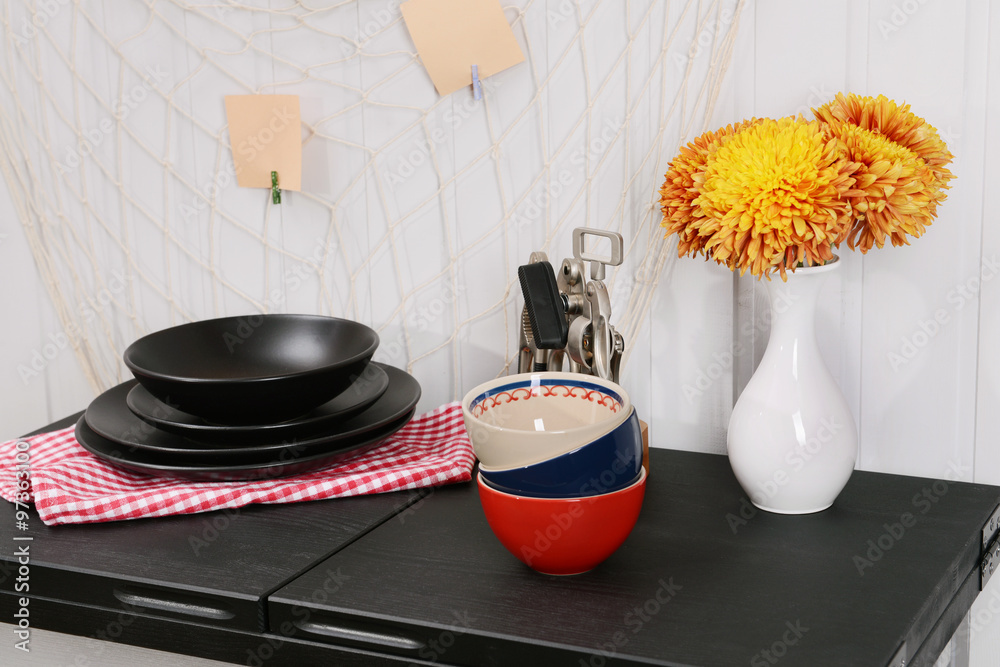 Kitchenware on table in the room