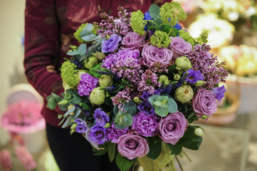 bouquey of gree, purple and blue flowers