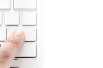 human finger pressing on white keyboard isolated on white backgr