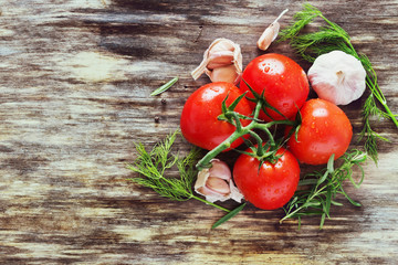 ripe tomatoes and herbs