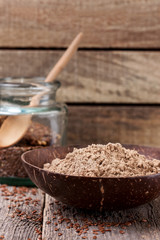 Wall Mural - flax flour in a bowl