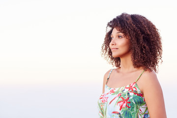 Confident woman looking away outdoors