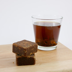 The Taiwan brown sugar ginger tea cubes on the wooden board.