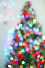 Wall Mural - Christmas lights on Christmas tree of abstract background