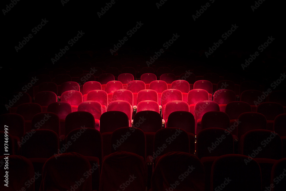 Lights on red seats in a theater - obrazy, fototapety, plakaty 