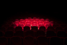 Lights On Red Seats In A Theater