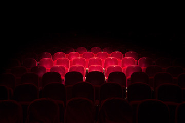 lights on red seats in a theater