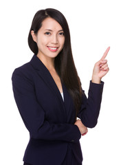 Wall Mural - Young Businesswoman showing finger point up