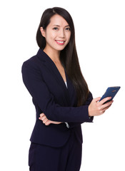 Wall Mural - Young Businesswoman use of the mobile phone