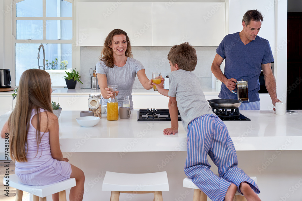 family in kitchen for breakfast - obrazy, fototapety, plakaty 
