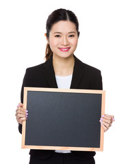 Wall Mural - Asian Businesswoman show with chalkboard