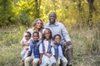 © Brocreative - Beautiful Multi Ethnic Family Portrait Outdoors