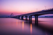 Sunrise,sunset Skyline And Bridge Over River