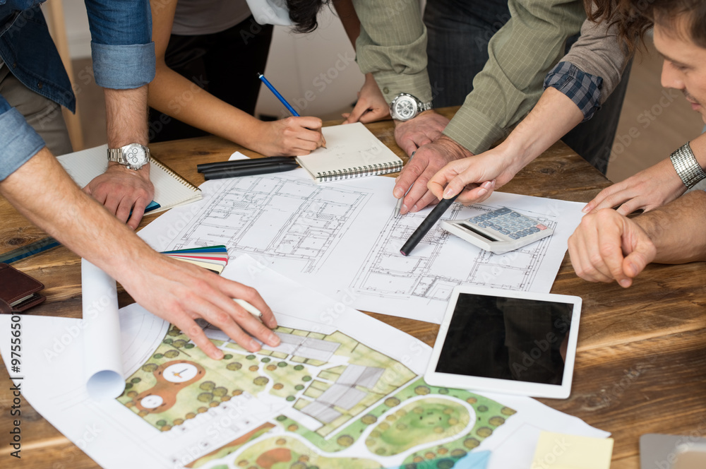 Blueprint Discussion Architect team discussing on blueprints Stock Photo | Adobe Stock